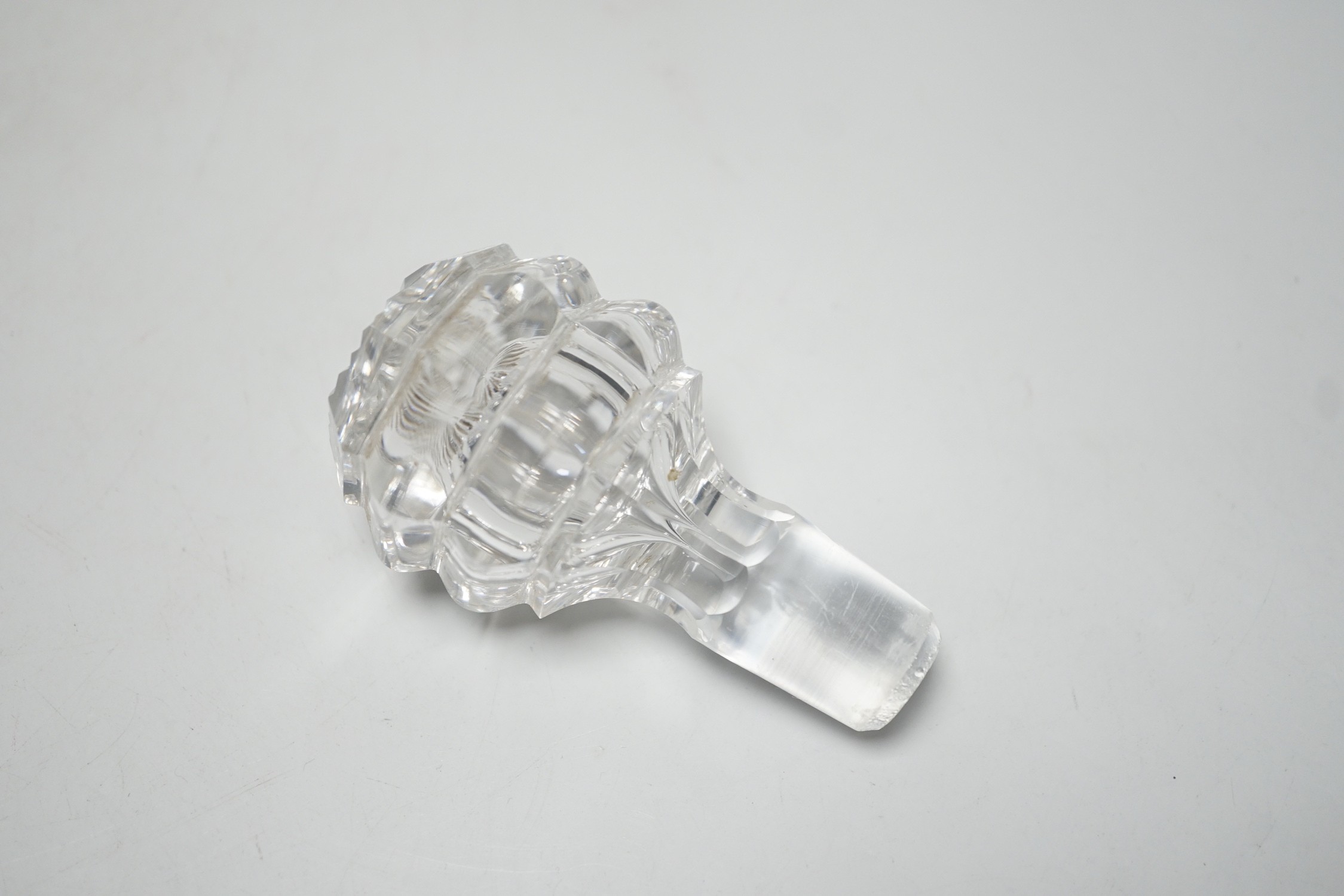 A pair of Victorian cut glass decanters and stoppers and one other, tallest 26cm